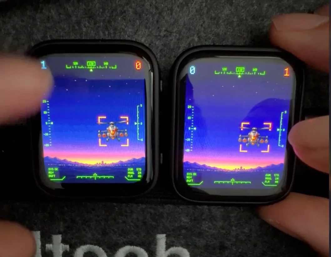 Two Limes handhelds side by side running the same helicopter game